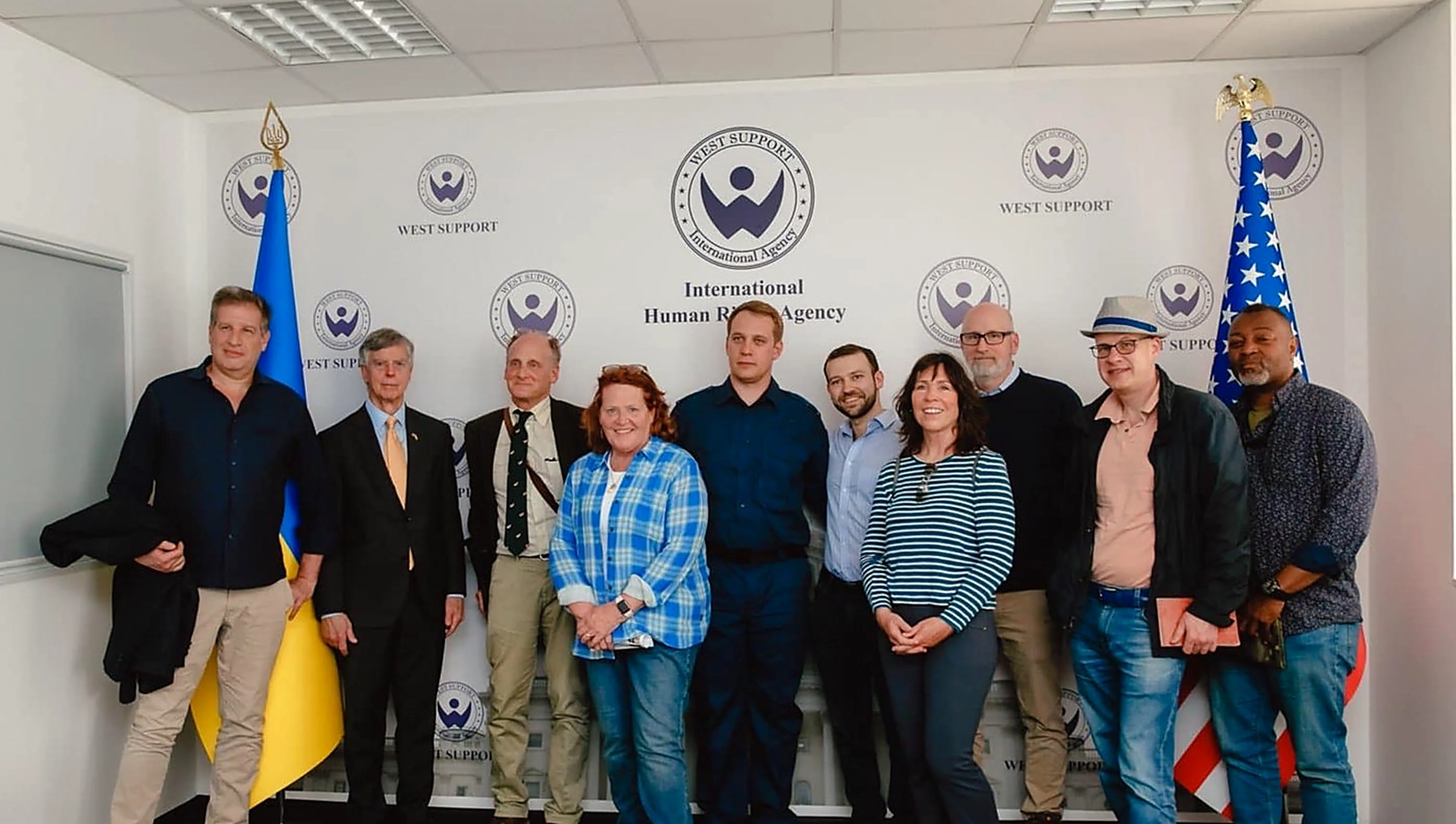 West Support team with international delegation at the agency office